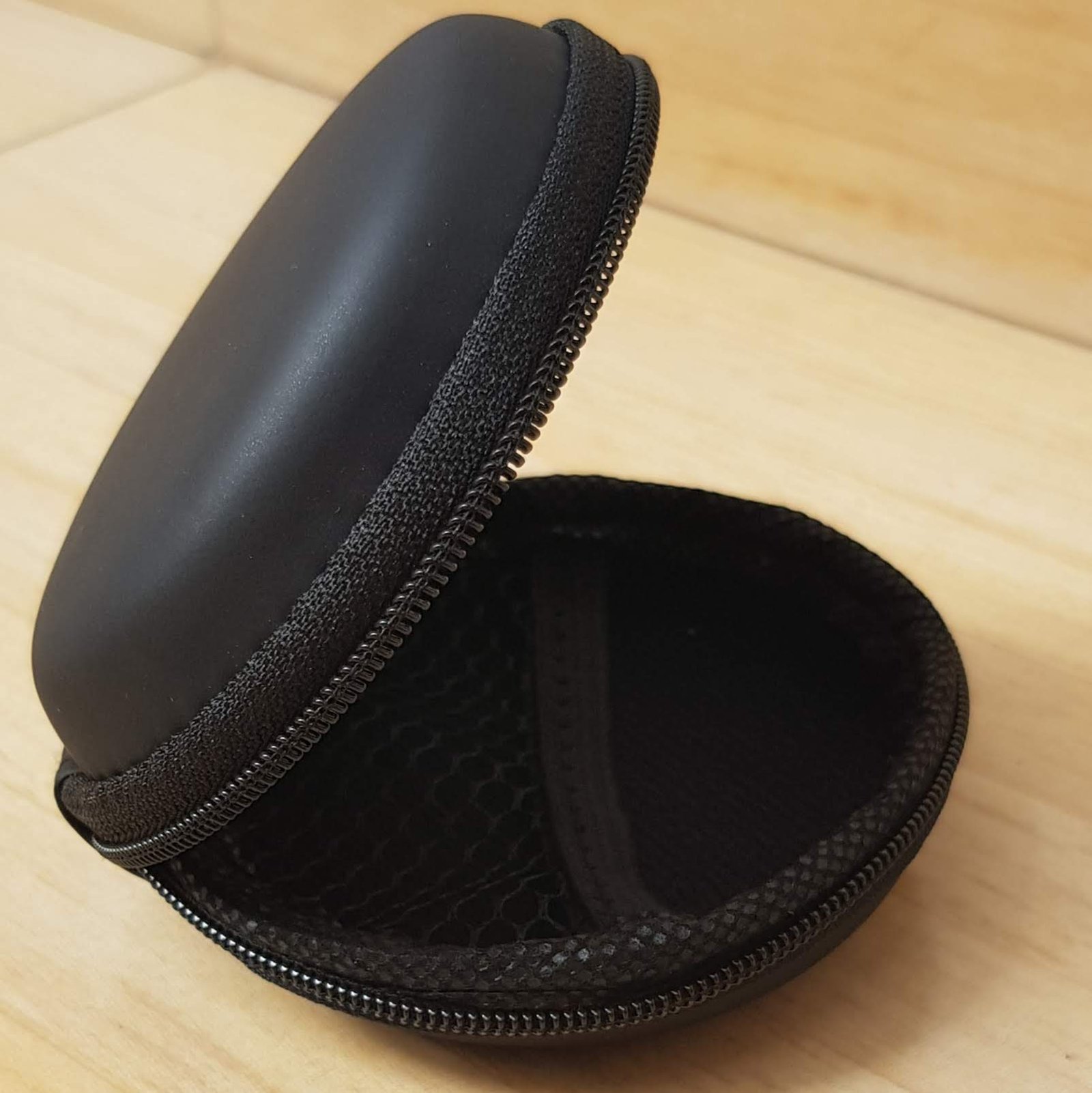 Semi hard rubber Earphone Pouch with zipper storage case round circle shape - black Semi hard rubber Earphone Pouch with zipper storage case round circle shape - black