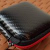 Semi hard rubber Earphone Pouch with zipper storage case almost square shape- black and red
